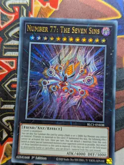 Number 77: The Seven Sins BLC1-EN038 Gold Ultra Rare 1st Edition NM Yugioh - Image 1