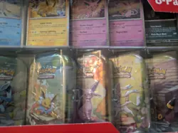 Pokemon TCG Scarlet & Violet Prismatic Evolutions Mini Tins - Image 3