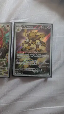 Mega Evolution Promos Riolu 010 and Alakazam 009 POKEMON CENTER STAMPED - Image 3