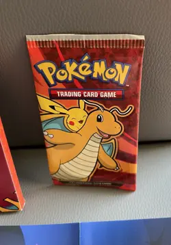 1x Pokemon 2025 McDonalds Dragons Discovery Pokemon TCG Booster Pack - Image 3