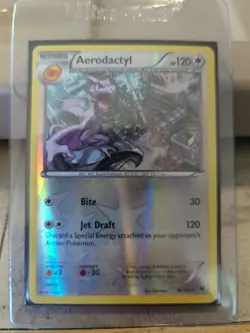 Pokemon TCG Fates Collide Aerodactyl 76/124 Reverse Holo Card NM Condition - Image 1