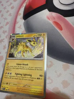 Jolteon SVP169 Cosmos Holo Black Star Promo Pokemon TCG Card with Ear Swirl - Image 1