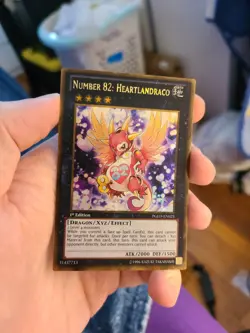 Yugioh Number 82: Heartlandraco PGLD-EN025 1st Gold Secret Rare - Image 1