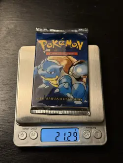 21.29g HEAVYU! 1999 Pokemon Portuguese Base Set Blastoise Booster Pack Sealed - Image 1
