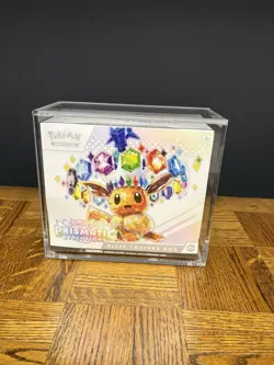 Pokemon Prismatic Evolutions ETB/NEW FACTORY SEALED W/acrylic Case Protector - Image 1