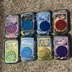 Pokemon Prismatic Cosmo Promo Cards (8) Mini Tin Evolutions Costco Pack - Image 1