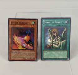 1996 Yu-Gi-Oh YuGiOh Holo Cards Sasuke Samurai PGD-015 & Graceful Charity SDP-04 - Image 1