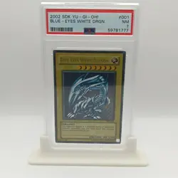 Yugioh TCG Blue- Eyes White Dragon SDK-001 Ultra Rare PSA 7 + Stand Included - Image 1