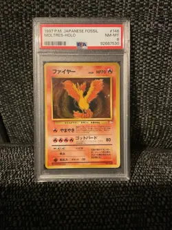 1997 Pokemon Japanese Fossil Moltres Holo PSA Near Mint 8 - Image 1
