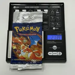 Pokemon Base Set Booster Pack Long Crimp with Charizard Art 21.39g Slightly Bent - Image 1