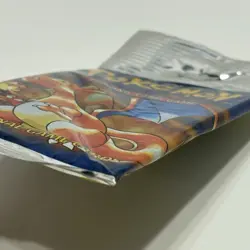 Pokemon Base Set Booster Pack Long Crimp with Charizard Art 21.39g Slightly Bent - Image 4