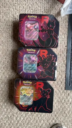 ALL THREE Pokemon TCG Team Rocket Destined Rivals Tin, Factory Sealed - Image 1