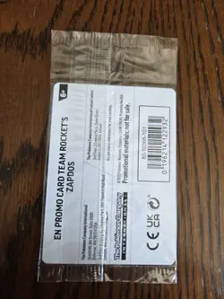 Team Rocket’s Zapdos Pokemon Promo Card - GameStop Exclusive - Holo Rare SEALED! - Image 2