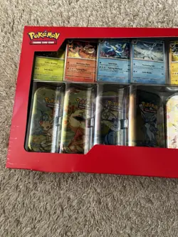 Pokemon TCG Prismatic Evolutions Costco 8 Mini-Tin Bundle - Image 2
