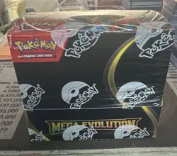 Pokemon TCG: Mega Evolution Factory Sealed Non Enhanced Booster Box In Hand - Image 1