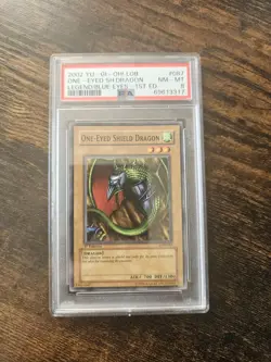 PSA 8 One-Eyed Shield Dragon LOB-087 1st Edition Yu-Gi-Oh! Near Mint 2002 - Image 1