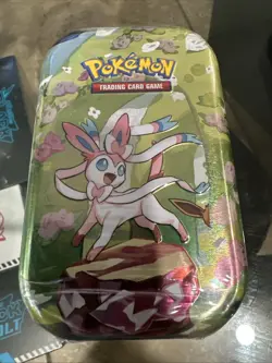 Pokemon Prismatic Evolutions Sylveon TCG Mini Tin Sealed Plus Sylveon Foil Card - Image 1