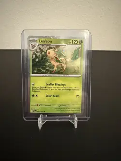 Pokemon Costco Prismatic Evolutions TCG Mini Tin Sealed + Leafeon Foil Card - Image 2