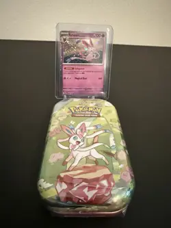 Pokemon Costco Prismatic Evolutions TCG Mini Tin Sealed + Sylveon Foil Card - Image 1