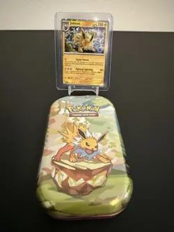 Pokemon Costco Prismatic Evolutions TCG Mini Tin Sealed + Jolteon Foil Card - Image 1