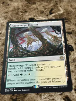 RAZORVERGE THICKET Magic MTG Phyrexia: All Will Be One - Image 1