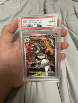 2025 POKEMON DRI EN-DESTINED RIVALS #191 TEAM ROCKET'S HOUNDOOM PSA 10 - Image 1