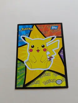 Topps Sticker Pokemon Pikachu sitting puzzle card Blue logo - Image 1