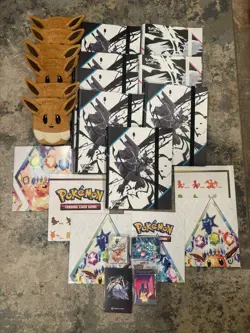Lot: 8 Pokemon Binders, 6 Eevee Prismatic Pouches, 6 Posters, Pikachu Box & More - Image 1