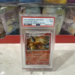 Charizard 017/090 PSA 7 Pt4 Advent of Arceus Japanese Holo Graded Pokemon Card - Image 1