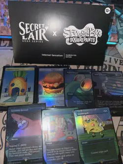 SECRET LAIR X SPONGEBOB SQUAREPANTS: INTERNET SENSATION FOIL EDITION IN HAND - Image 1