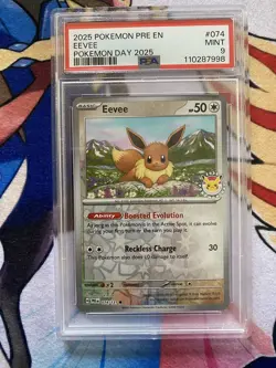 PSA 9 Mint Eevee 074/131 Pokemon Day 2025 Stamped Holo - Pokemon SV8.5 PRE - Image 1
