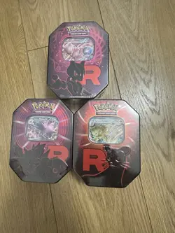 Pokemon TCG: Team Rocket Tin - Set of 3 New And Sealed - Image 1