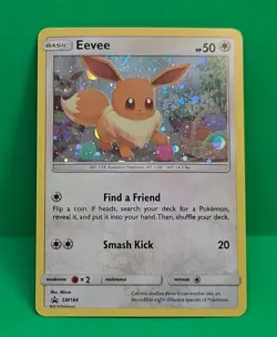 Pokemon Unbroken Bonds MINT Condition Cosmos Swirl Holo Eevee SM184 Rare Card - Image 2