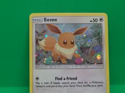 Pokemon Unbroken Bonds MINT Condition Cosmos Swirl Holo Eevee SM184 Rare Card - Image 5