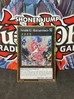 Yugioh Number 82: Heartlandraco PGLD-EN025 Gold Secret Rare NM - Image 1