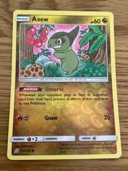 Axew Pokemon Card 154/236 Reverse Holo- Used -Sun & Moon-Unified Minds - Image 1