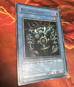 Relinquished SDP-001 Super Rare Holo Yugioh Card - Image 1