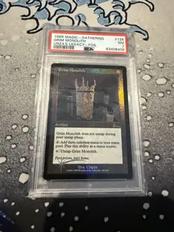 MTG Foil Grim Monolith Graded PSA 7 - Image 1