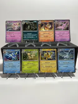 Pokemon Prismatic Cosmo Promo Cards (8) Mini Tin Evolutions Costco Pack - Image 1