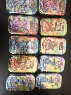 POKEMON SCARLET & VIOLET PRISMATIC EVOLUTIONS LOT OF 10 MINI TIN-NEW SEALED - Image 1
