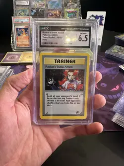 2000 POKEMON TEAM ROCKET 1ST EDITION ROCKET'S SNEAK ATTACK 16/82 HOLO CGC 6.5 - Image 1