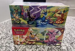 Pokemon Prismatic Evolutions Mini Tin Display Box (8 Tins) - Factory Sealed! - Image 1