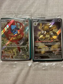Alakazam 009 and Riolu 010 Black Star Promo Pokemon Center stamp - Image 1