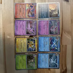 Pokemon TCG Prismatic Evolutions Costco Mini Tin Cosmos Promo Cards Set Of 8 NM - Image 1