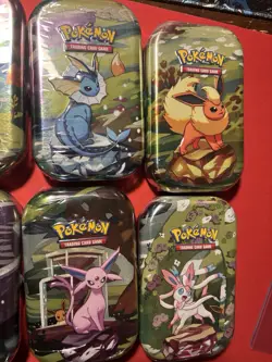 Pokemon TCG Prismatic Evolutions Mini Tin Complete Set - 8 Factory Sealed Tins - Image 3