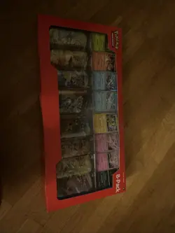 Pokemon TCG Scarlet & Violet Prismatic Evolutions Mini Tins Sealed 8 Pack Costco - Image 1