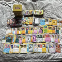 Joblot Pokemon Cards - 100+ 1 Stack Em High Tin, 2 X Small Tins Packets (empty) - Image 1