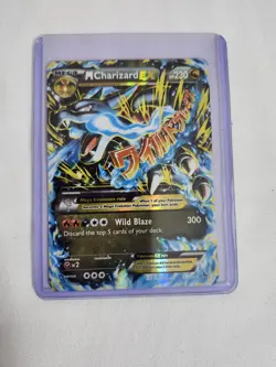 M Charizard EX (X) 69/106 Flashfire Holo Pokemon card: Excellent condition - Image 1