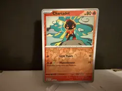 2024 Pokemon TCG Charcadet 033 Surging Sparks Reverse Holo Card NM+ - Image 1