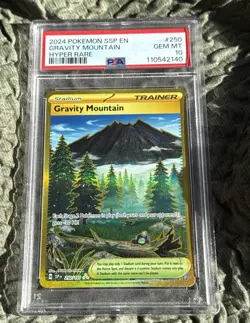 Gravity Mountain Pokemon 2024 SSP Hyper Rare Gold Card 250/191 PSA GEM MT 10 - Image 1